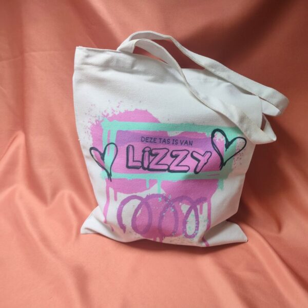 canvastas met naam en afbeelding in roze tinten. kleur tas is wit