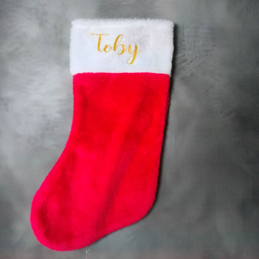 Kerst sok met naam. zachte rode sok met gouden bedrukking