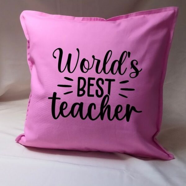 Kleurrijk roze kussen met bedanktekst voor juf of meester — origineel einde schooljaar cadeau in vrolijke kleuren. Werelds beste leraar!