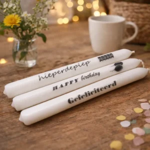 Witte kaarsen met tekst